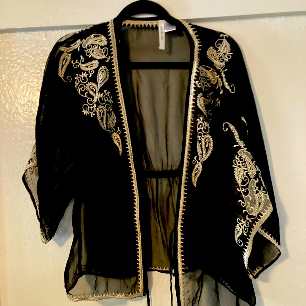 Beautiful top to wear over a bathing suit or silk top or lingerie